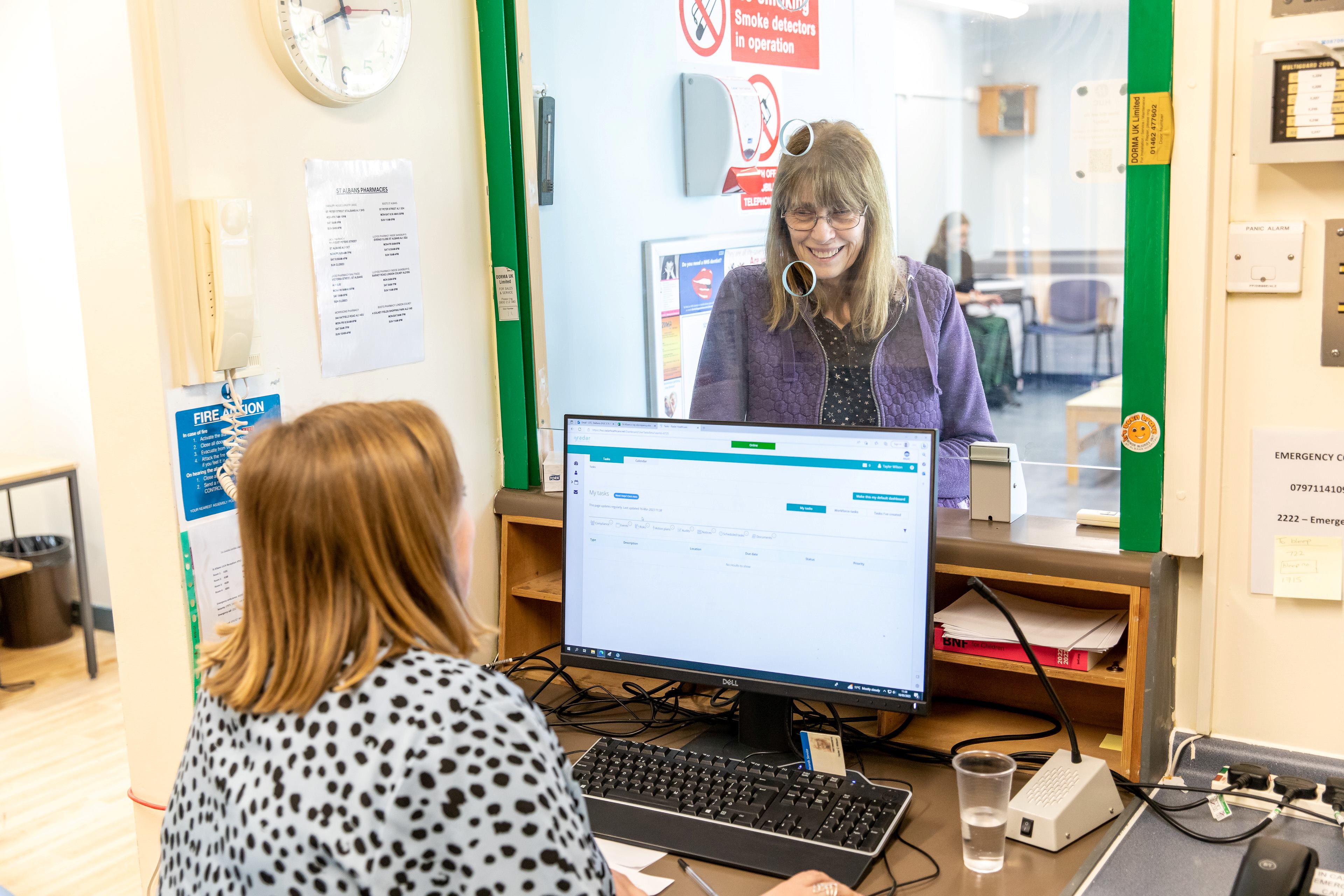 Receptionist and patient